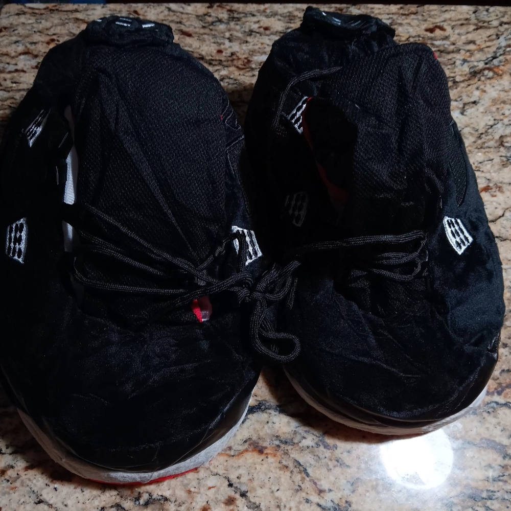 Bred Jordan 4 cozy slippers price value at 70
